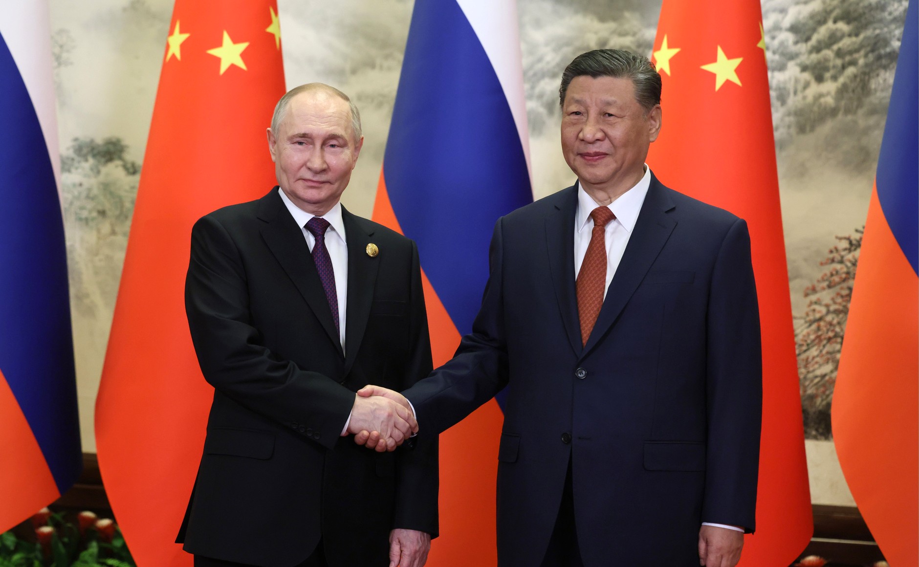 Vladimir Poutine et Xi Jinping en réunion en 2024
